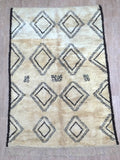 Vintage moroccan beni ouarain rug